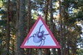 Precautionary sign Carefully Ã¢â¬â Pincers in the forest